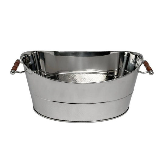Polished stainless steel oval beverage tub with brown leather side handles for entertaining.