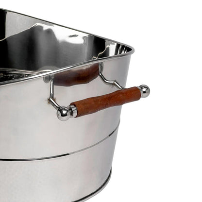 Polished stainless steel oval beverage tub featuring brown leather handles for a modern, sophisticated look.