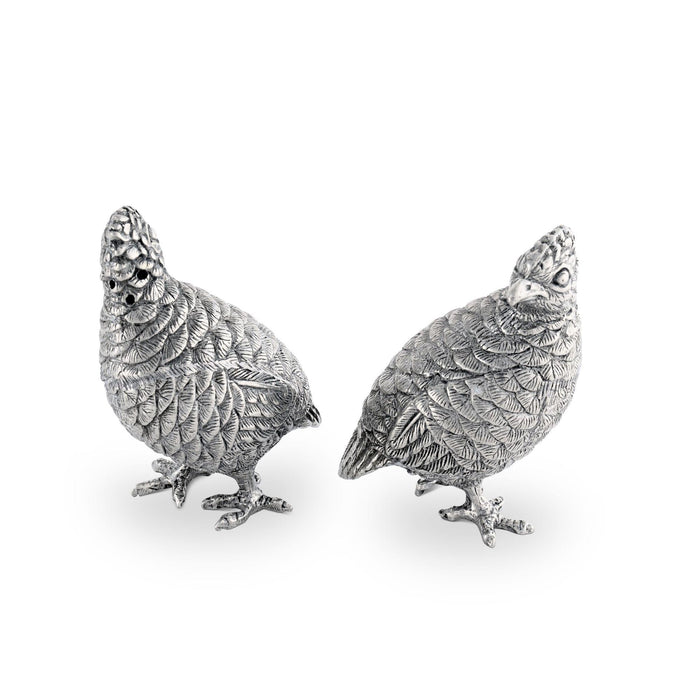 Two 3.5-inch hand-crafted pewter quail salt and pepper shakers with intricate feather detailing.