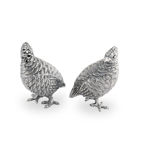 Two 3.5-inch hand-crafted pewter quail salt and pepper shakers with intricate feather detailing.
