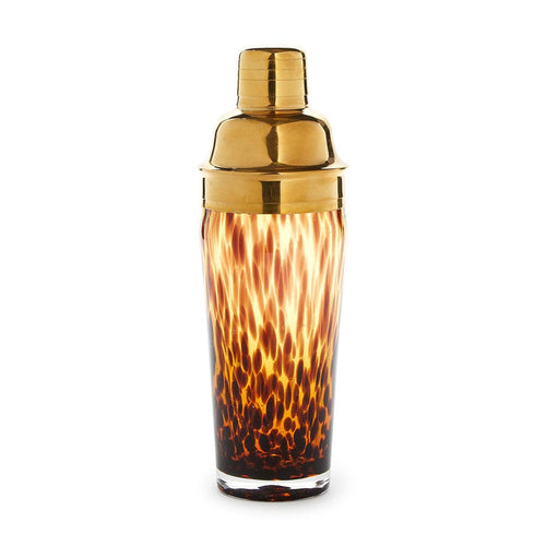 Glass cocktail shaker with a brown tortoise print pattern and a polished gold stainless steel lid.