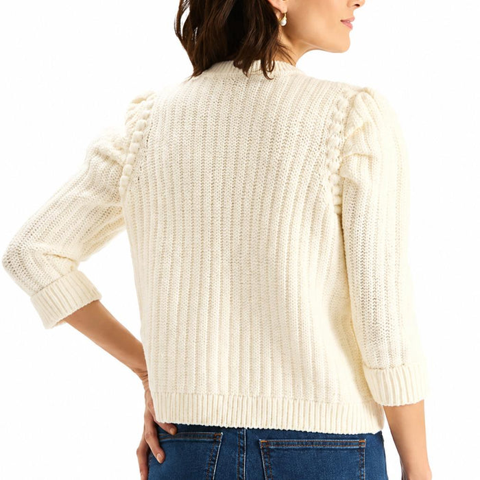 Tyler Boe cream cotton-blend knit jacket featuring a cropped fit, ribbed texture, and puffed three-quarter sleeves.