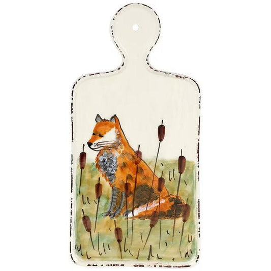 Hand-painted Italian ceramic cheese board featuring a fox in cattails on an 11.25-inch cream-colored paddle design.