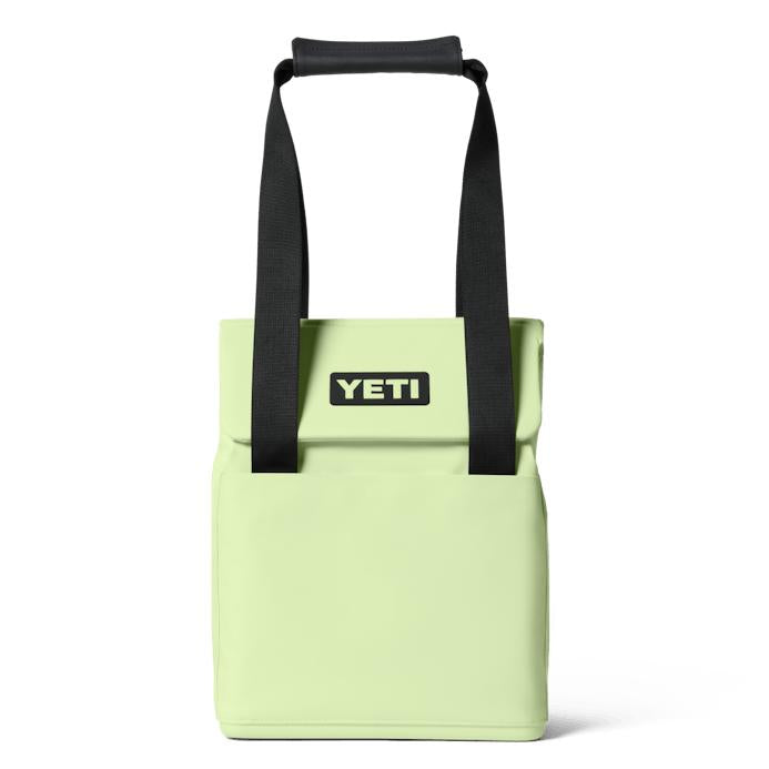 Light green YETI Daytrip 14L insulated tote bag with black straps, MagSnap closure, and front stash pocket on white background.