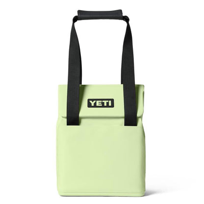 Light green YETI Daytrip 14L insulated tote bag with black straps, MagSnap closure, and front stash pocket on white background.