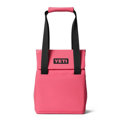 YETI Daytrip 14L insulated tote in bright pink with black straps, MagSnap closure, and front YETI logo patch.