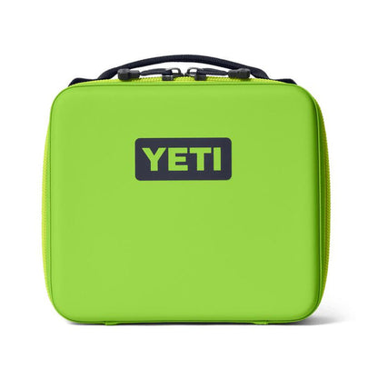 Bright lime green YETI Daytrip 3L insulated lunch box with a rugged, structured design and black top handle.