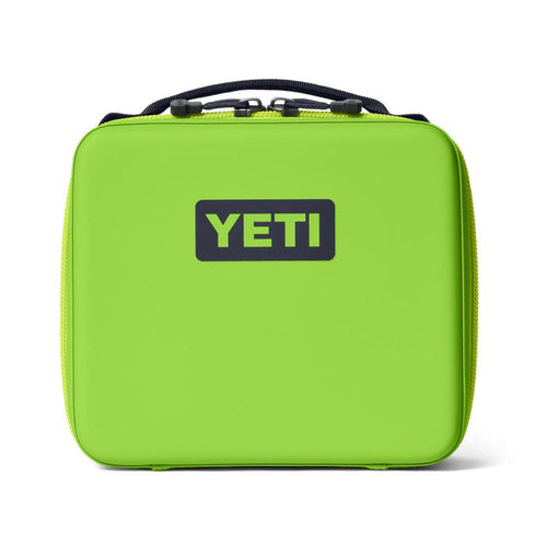 Bright lime green YETI Daytrip 3L insulated lunch box with a rugged, structured design and black top handle.