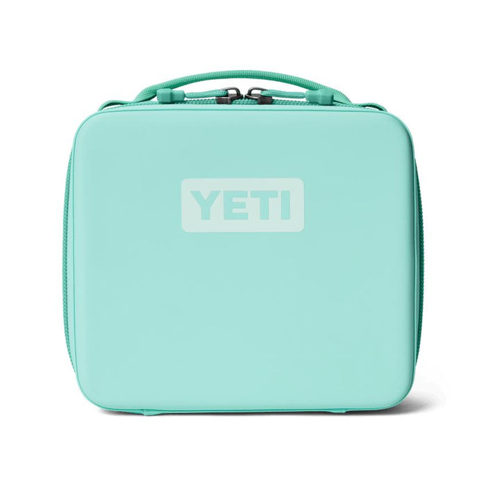 YETI Daytrip 3L insulated lunch box in light teal with a rugged, water-resistant exterior and top carry handle.