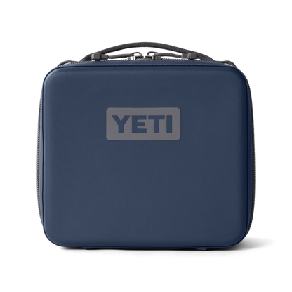 Navy blue YETI Daytrip 3L insulated lunch box with a rugged, water-resistant exterior and top carry handle.
