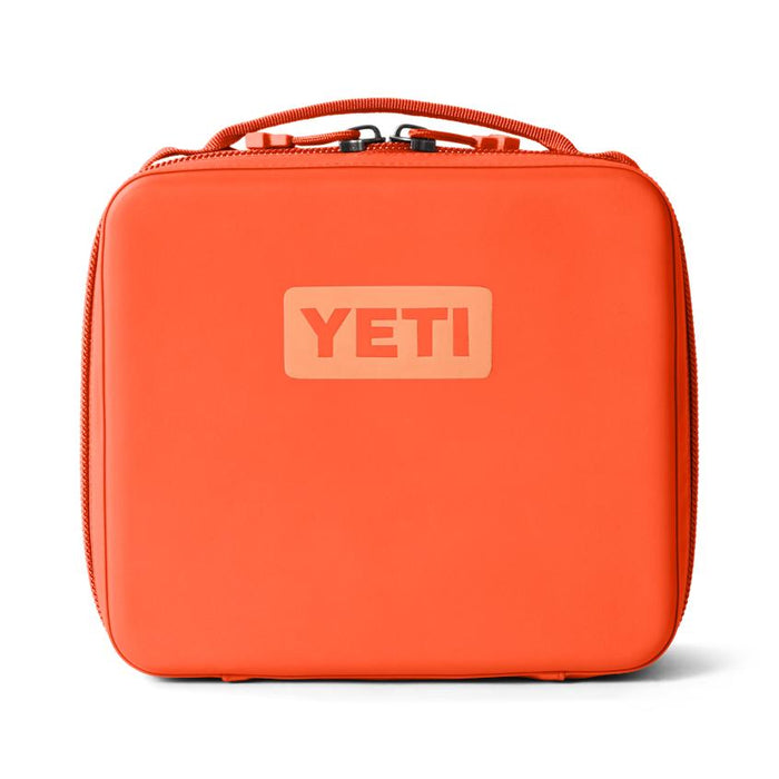 Bright orange YETI Daytrip 3L insulated lunch box with a rugged, water-resistant exterior and top carry handle.