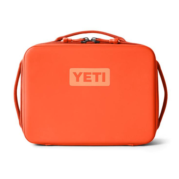 Bright orange YETI Daytrip 5L insulated lunch box with a rigid, water-resistant exterior and top carry handle.