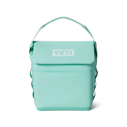 Light blue YETI Daytrip 6L insulated lunch bag with a top handle, MagSnap closure, and durable, upright rectangular design.