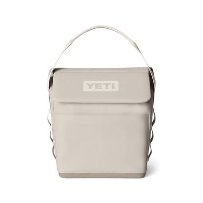 Beige YETI Daytrip 6L insulated lunch bag with a structured upright design, top handle, and secure MagSnap closure.