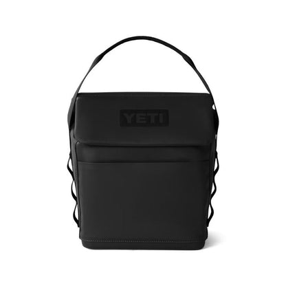 Black YETI Daytrip 6L insulated lunch bag with a structured upright design, top handle, and front MagSnap closure.