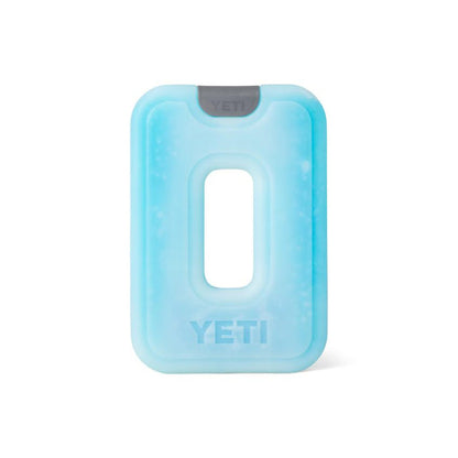 Light blue, rectangular YETI Ice Sheet with a center cutout and grey YETI branding for cooler ice retention.