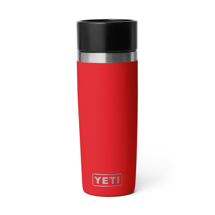 Red 16 oz Yeti Rambler travel bottle with a black leakproof 360-degree commuter cap on a white background.