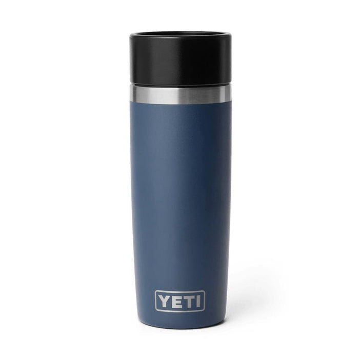 Navy blue 16 oz Yeti Rambler travel bottle with a black leakproof commuter cap and stainless steel rim on white.