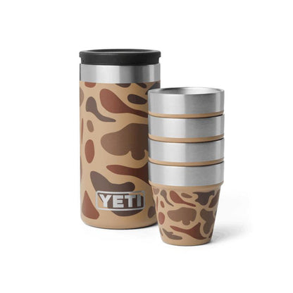 YETI stainless steel shot glass set in tan camo print with a matching stackable carrying case on a white background.