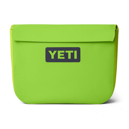 Bright lime green YETI Sidekick Dry 6L waterproof gear case with a magnetic closure and durable RF-welded seams.
